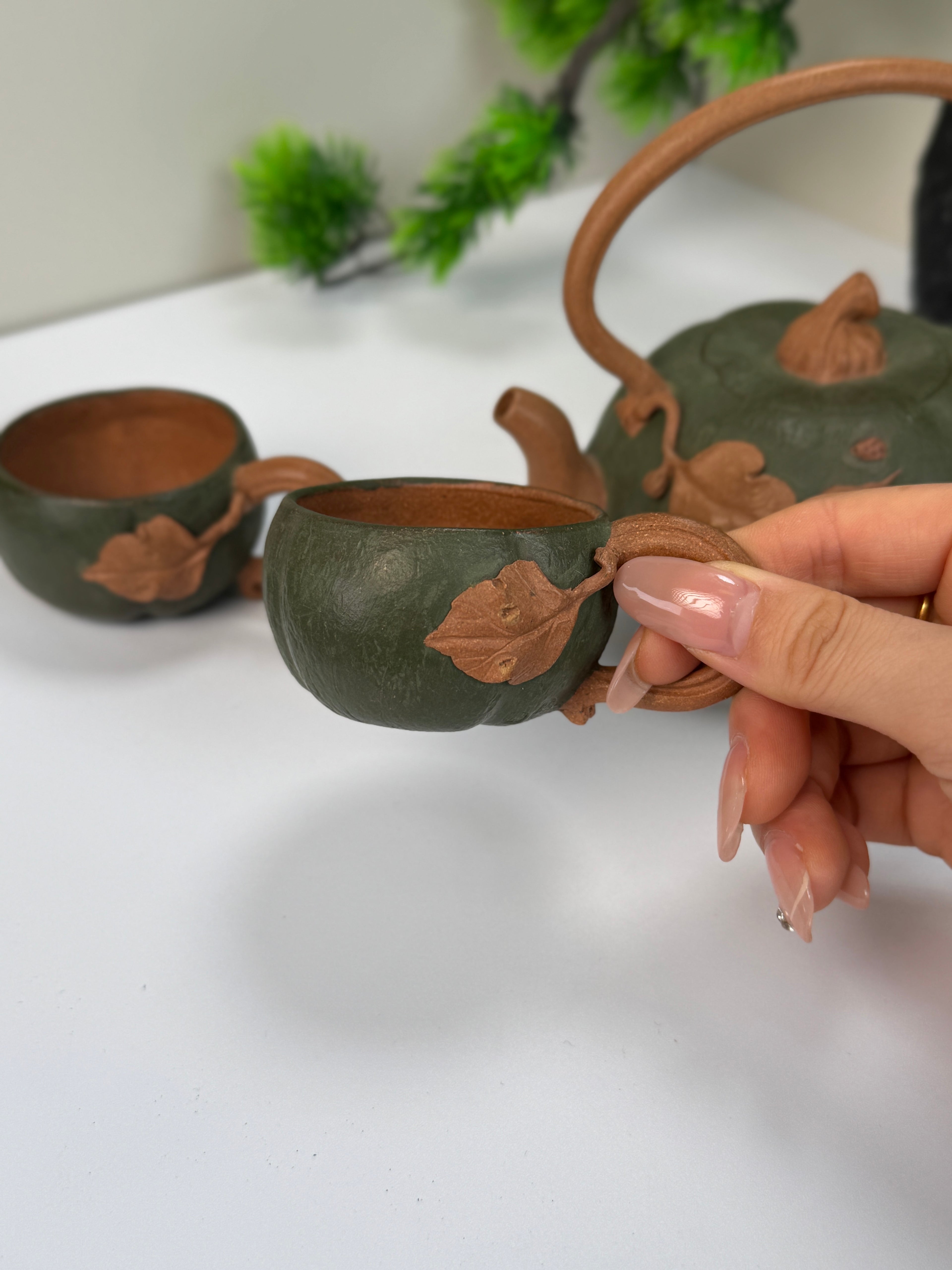 A very creative Yixing clay teapot set with traditional pumpkin design